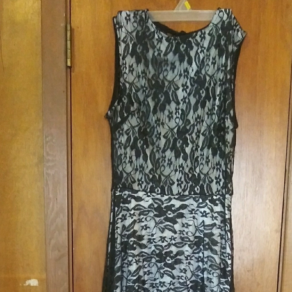 +Black with sheet overlay. Long lace train.